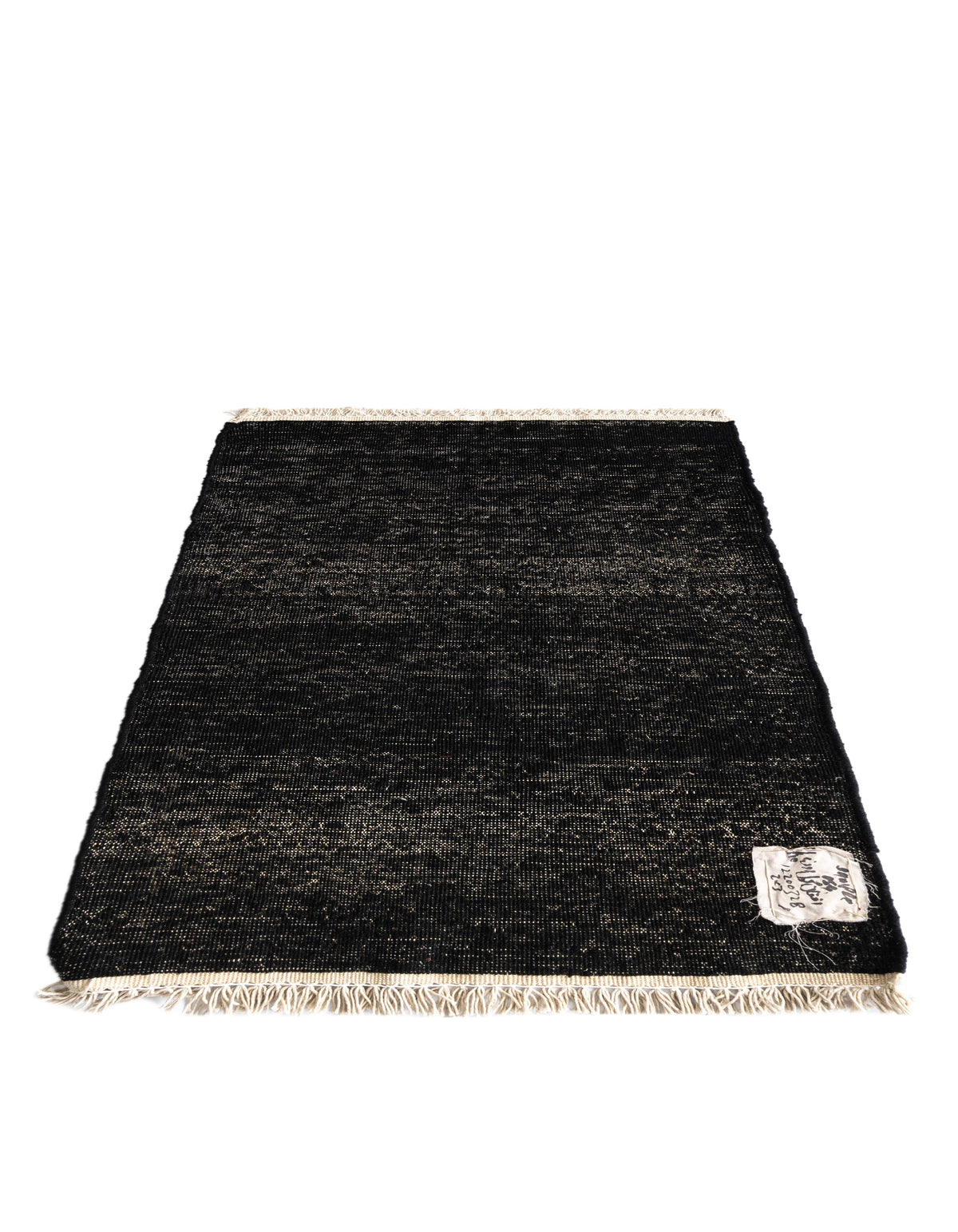 Wolle Teppich Juma Kelim in Schwarz von Hadorn™ - Lifestyle Image