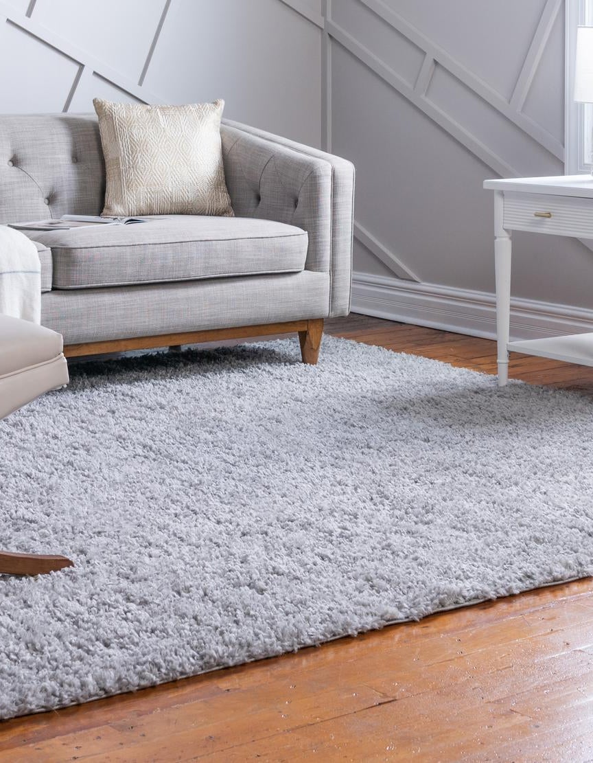 Quadratisch Hochflorteppich Zermatt Shag in Grau von Hadorn™ - Lifestyle Image