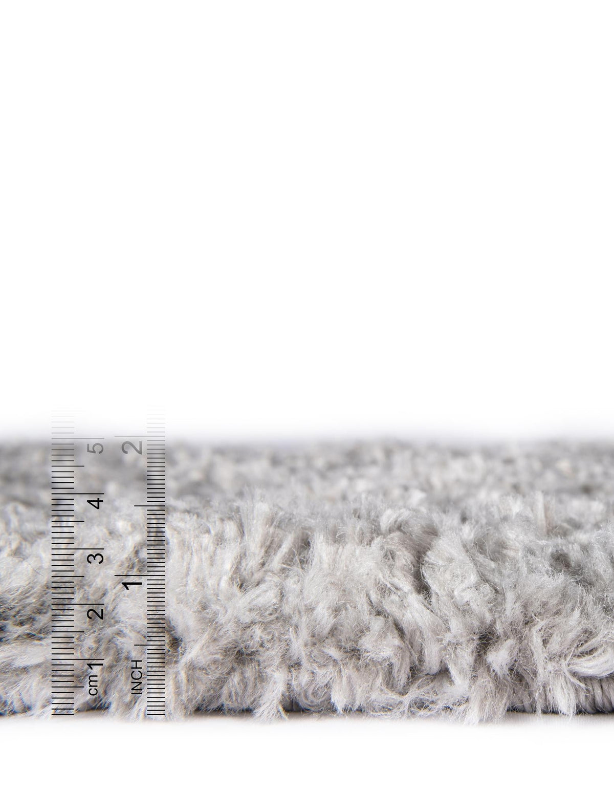 Rund Hochflorteppich Zermatt Shag in Grau von Hadorn™ - Lifestyle Image