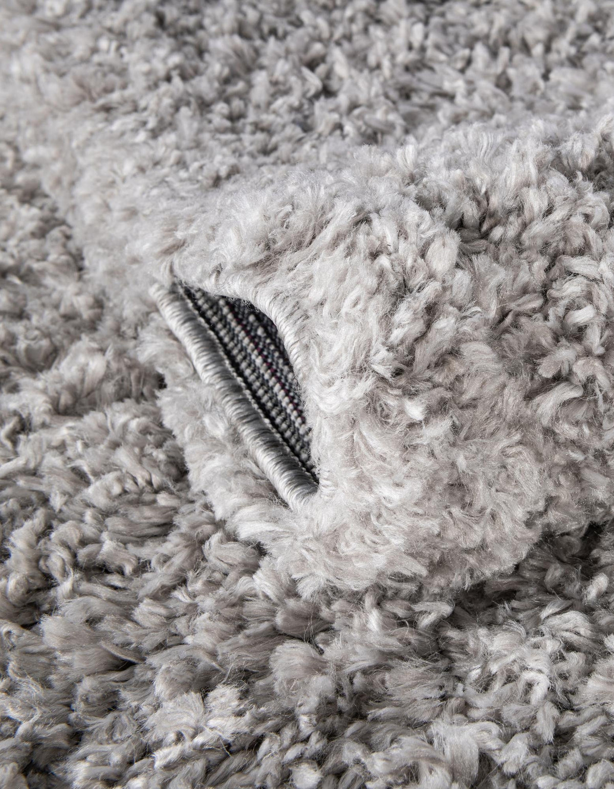 Rund Hochflorteppich Zermatt Shag in Grau von Hadorn™ - Lifestyle Image