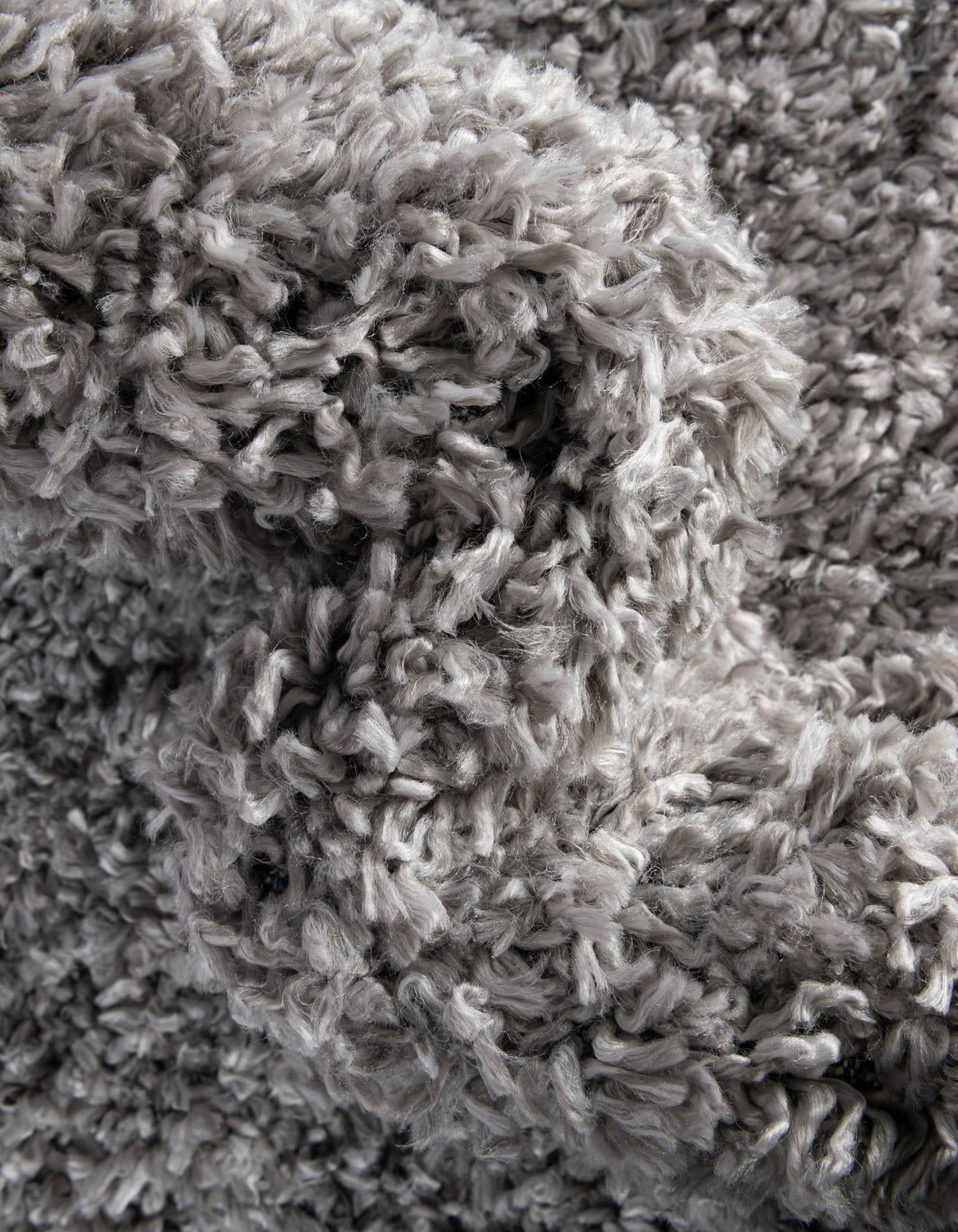 Rund Hochflorteppich Zermatt Shag in Grau von Hadorn™ - Lifestyle Image