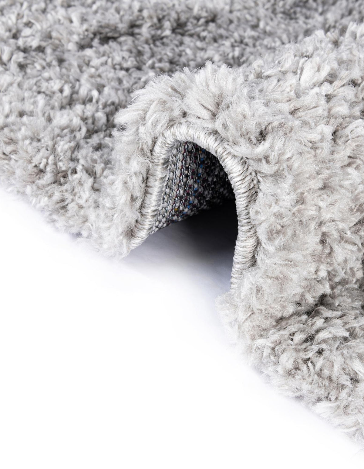 Rund Hochflorteppich Zermatt Shag in Grau von Hadorn™ - Lifestyle Image