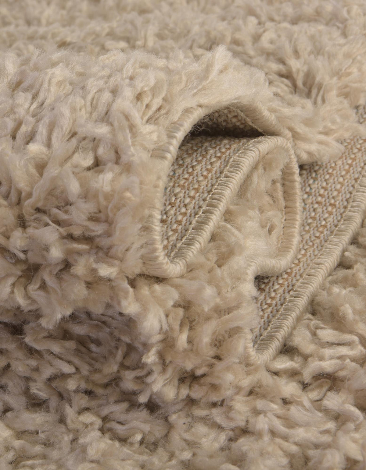 Quadratisch Hochflorteppich Zermatt Shag in Beige von Hadorn™ - Lifestyle Image