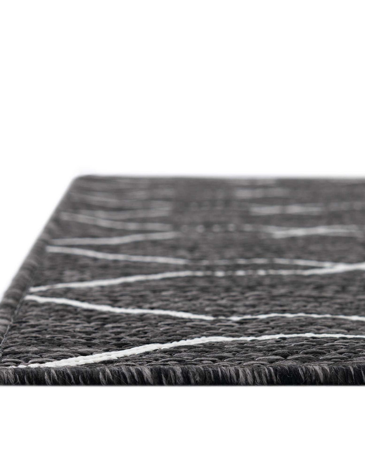 Rechteck Outdoor Teppich Tulum Outdoor Fence in Holzkohle von Hadorn™ - Lifestyle Image