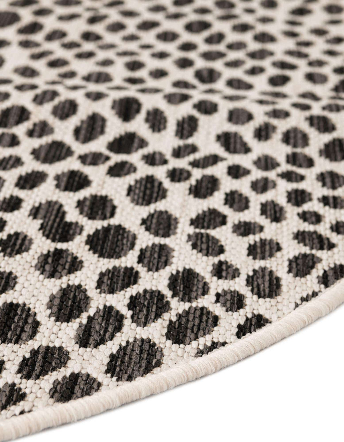 Rund Outdoor Teppich Tulum Outdoor in Schwarz von Hadorn™ - Lifestyle Image