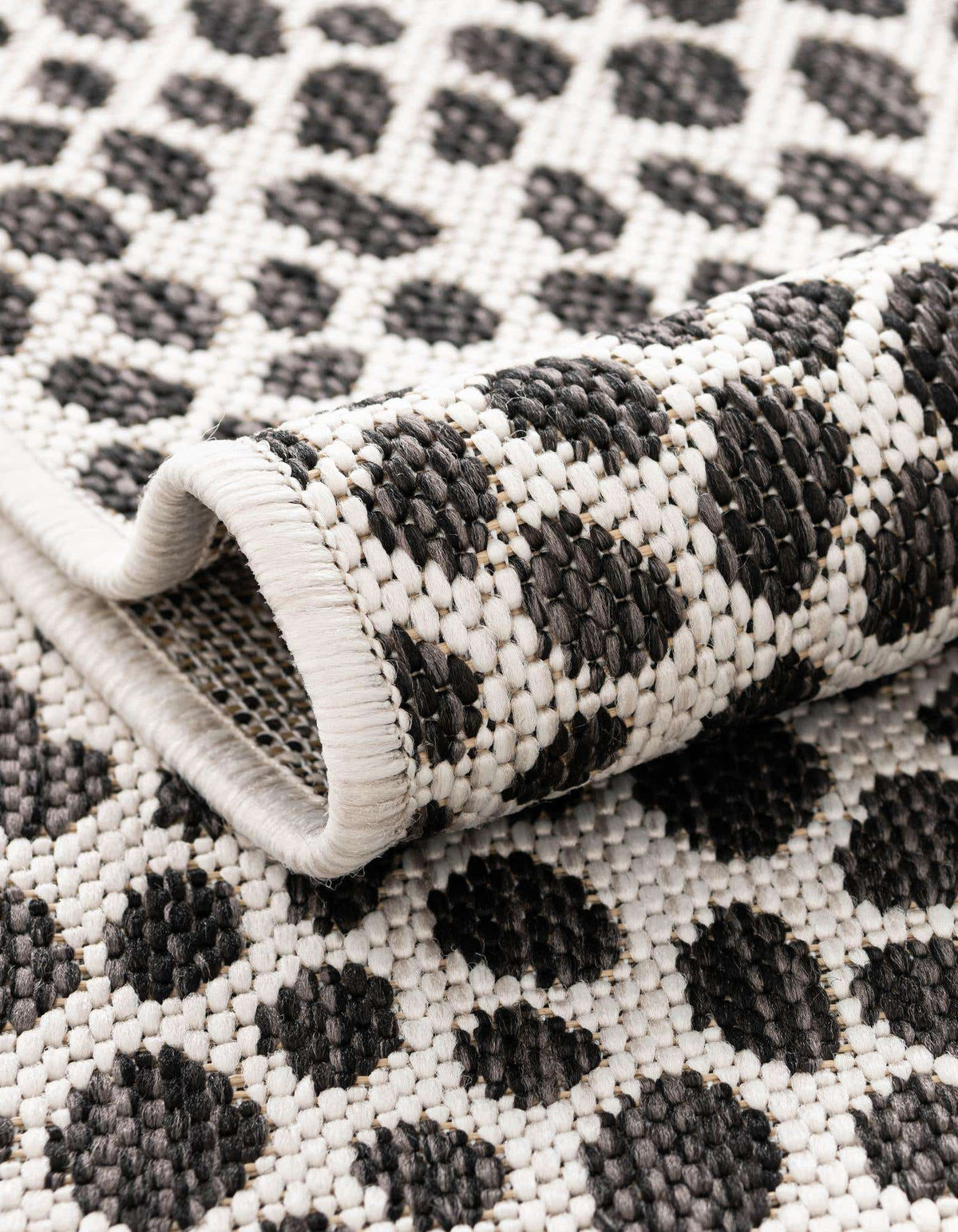 Rechteck Outdoor Teppich Tulum Outdoor in Schwarz von Hadorn™ - Lifestyle Image