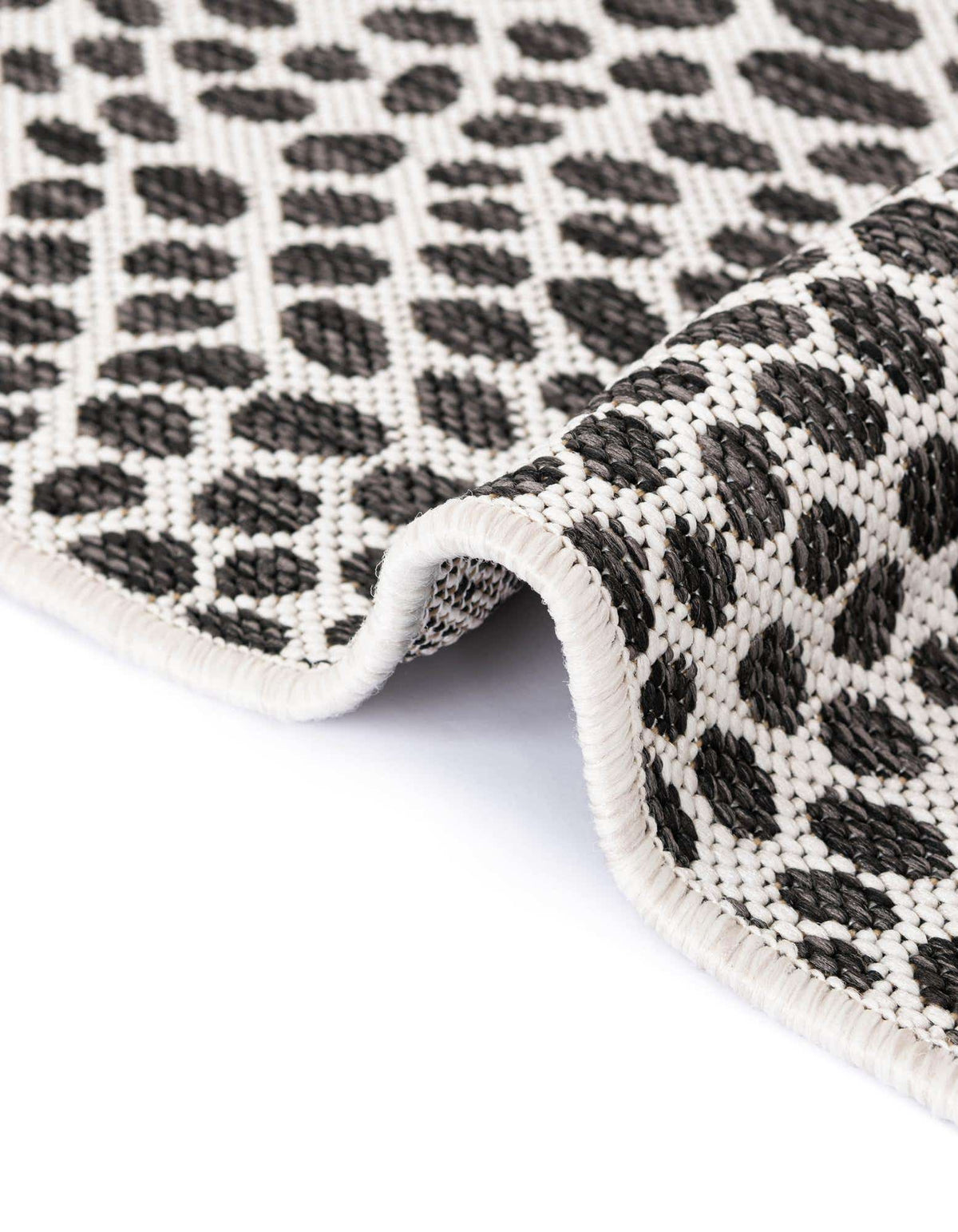 Rechteck Outdoor Teppich Tulum Outdoor in Schwarz von Hadorn™ - Lifestyle Image