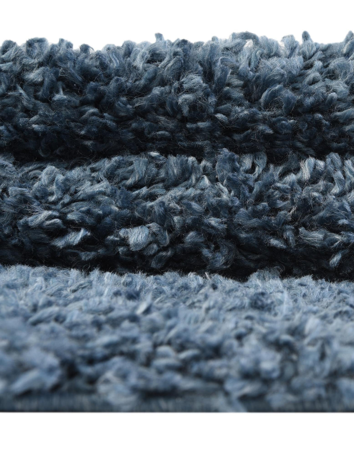Quadratisch Hochflorteppich Zermatt Shag in Blau von Hadorn™ - Lifestyle Image