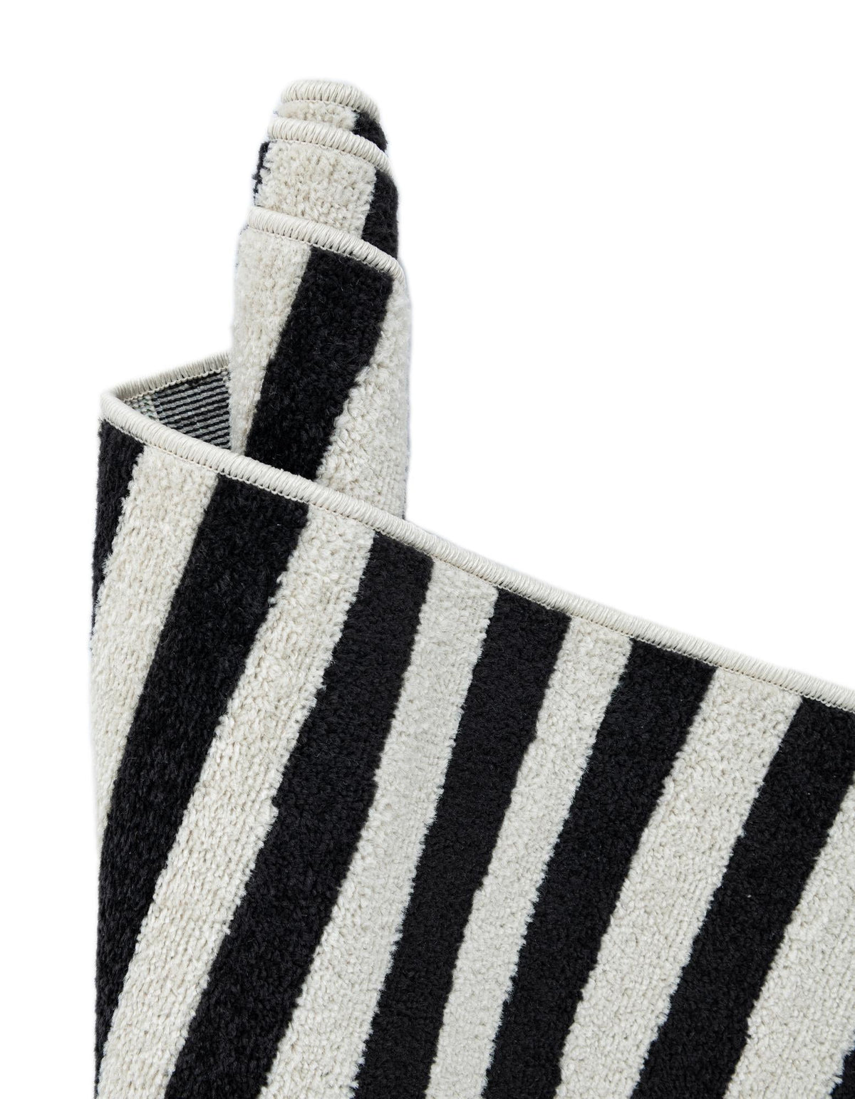 Quadratisch Teppich Tribeca in Schwarz von Hadorn™ - Lifestyle Image