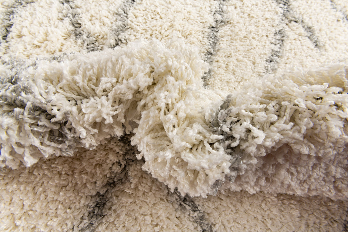 Rund Teppich Lachen Fence in Creme von Hadorn™ - Lifestyle Image