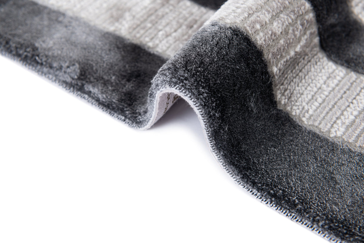 Rund Luxus Teppich Chiasso in Grau von Hadorn™ - Lifestyle Image