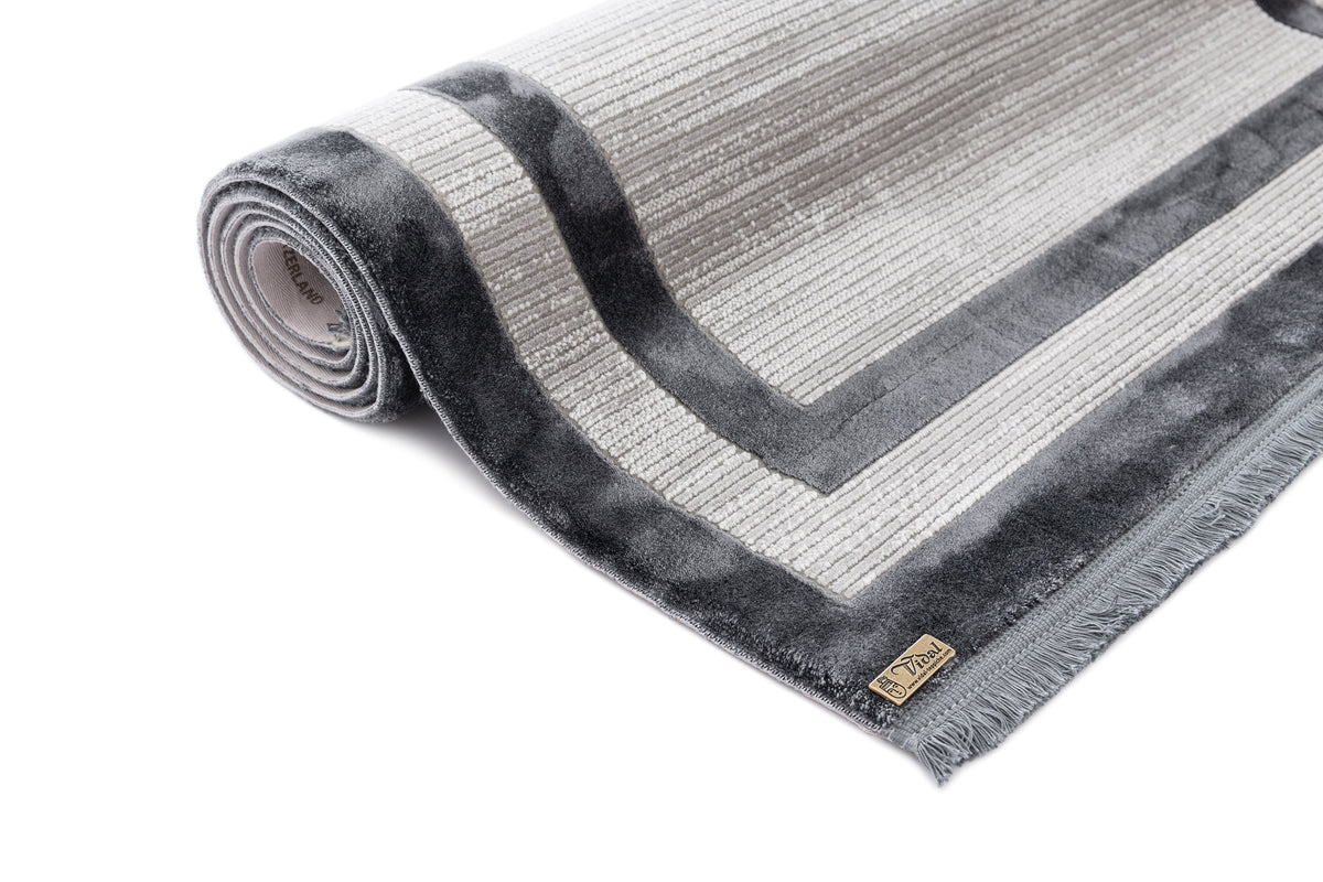 Rund Luxus Teppich Chiasso in Grau von Hadorn™ - Lifestyle Image