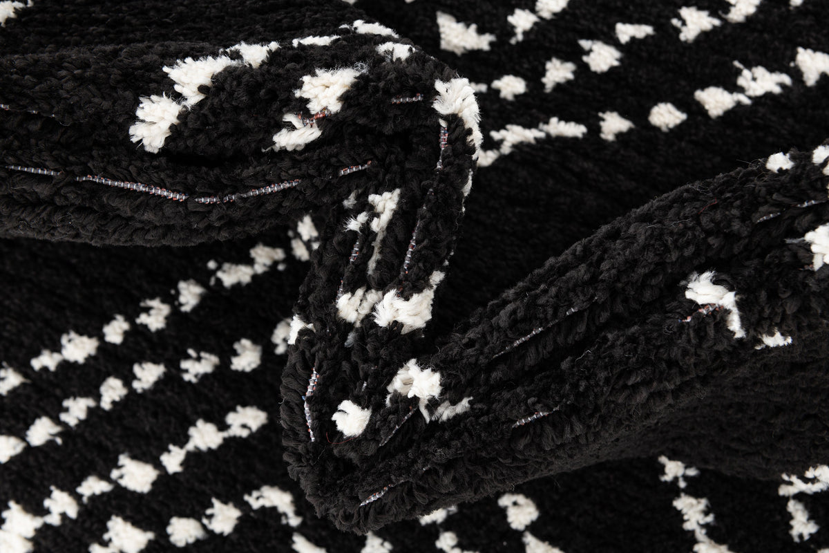 Rechteck Teppich Frauenfeld Vaiana in Schwarz von Hadorn™ - Lifestyle Image