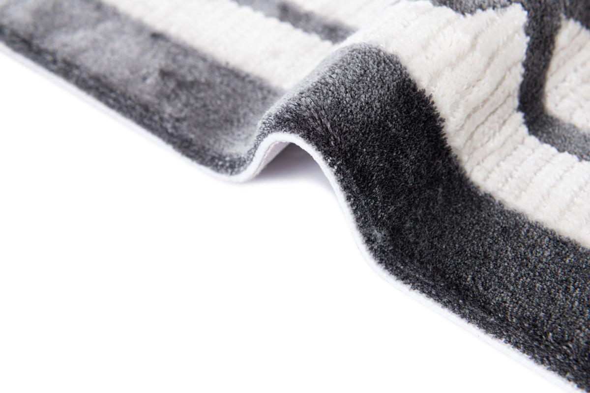 Rund Luxus Teppich Chiasso in Grau von Hadorn™ - Lifestyle Image