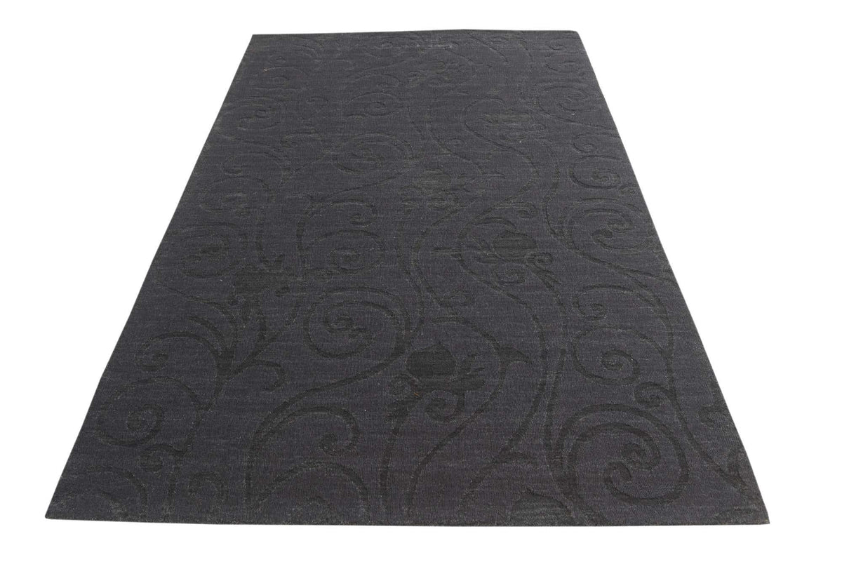 Wolle und Baumwolle Teppich Luna in Schwarz von Hadorn™ - Lifestyle Image