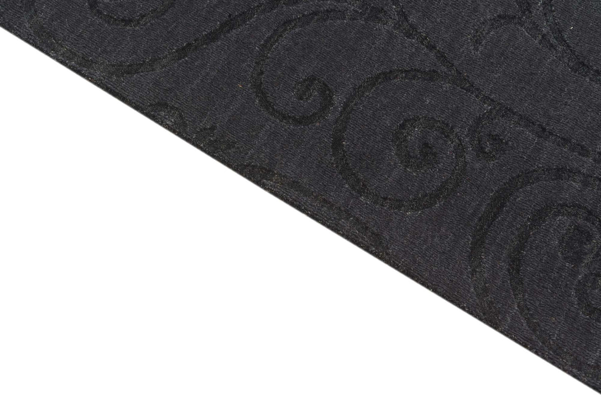 Wolle und Baumwolle Teppich Luna in Schwarz von Hadorn™ - Lifestyle Image