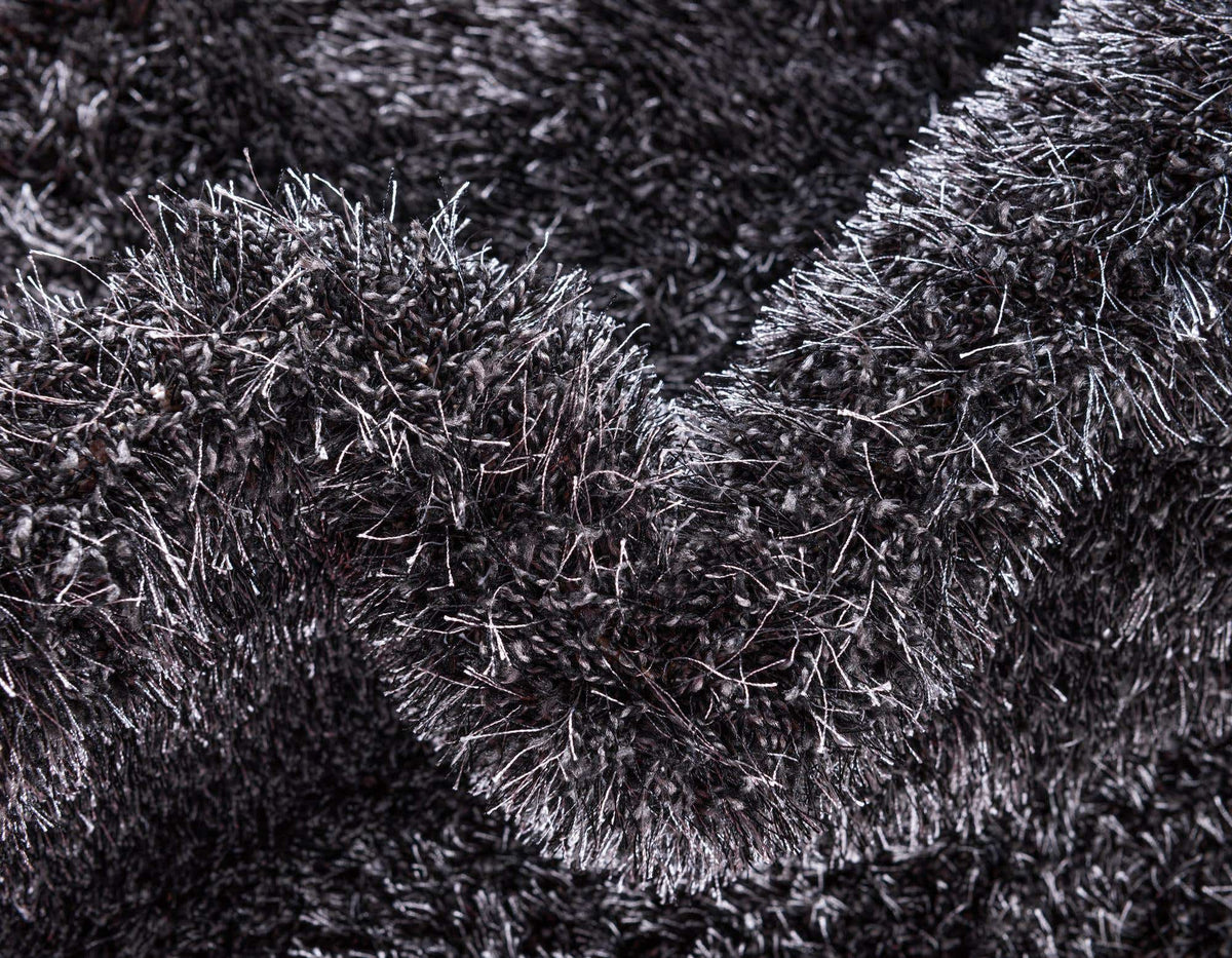 Rechteck Hochflorteppich Luxe Solid Shag in Schwarz von Hadorn™ - Lifestyle Image