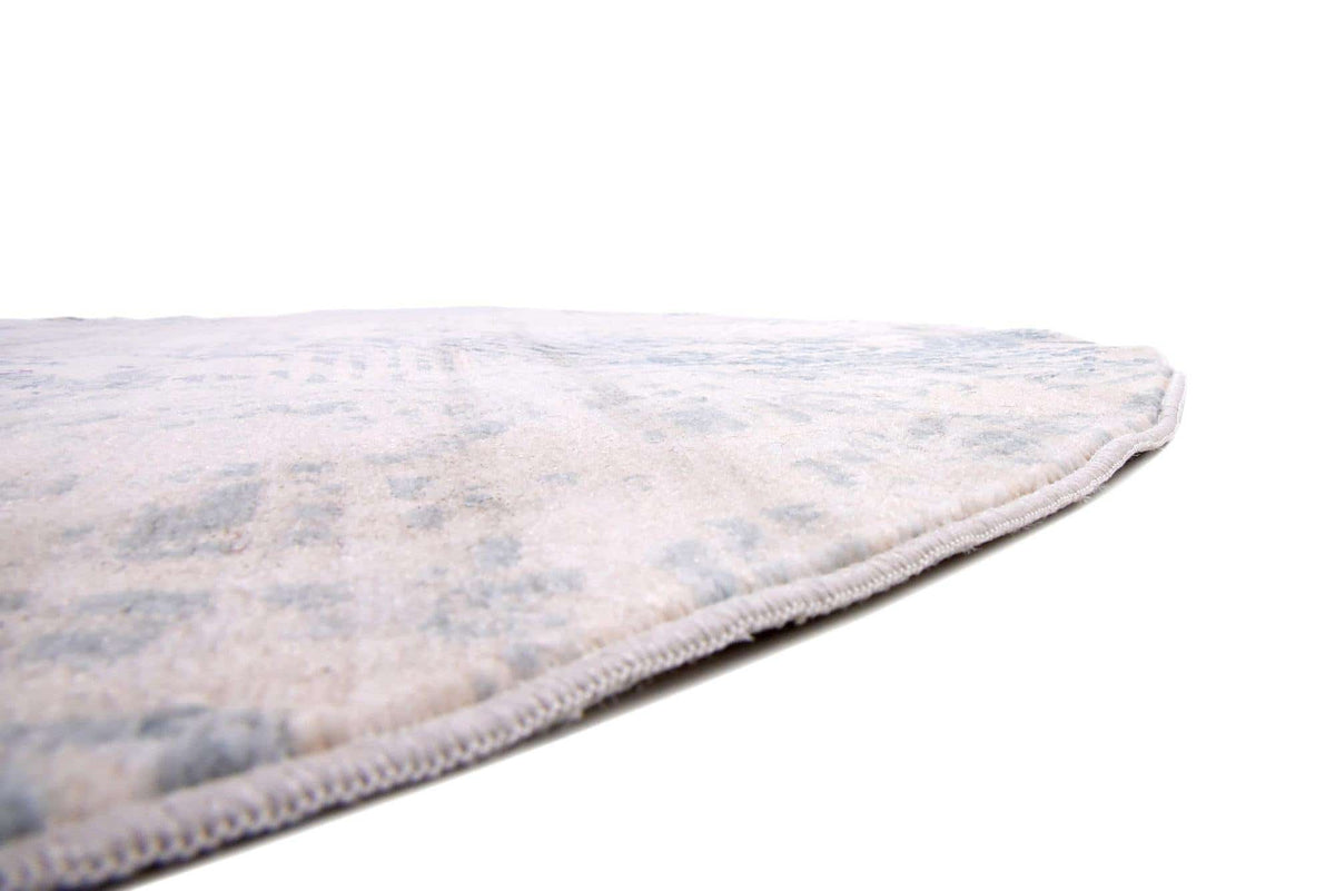 Rund Teppich Restoration in Blau von Hadorn™ - Lifestyle Image