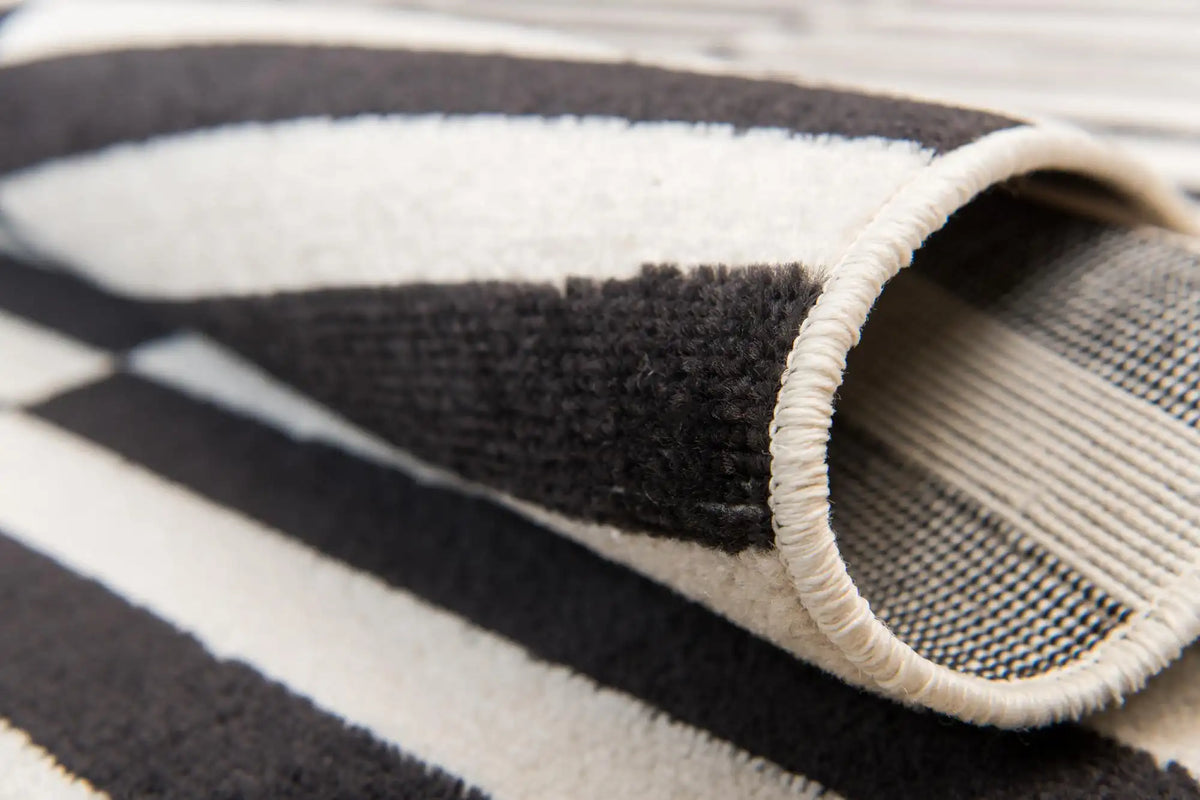 Rechteck Teppich Tribeca in Schwarz von Hadorn™ - Lifestyle Image