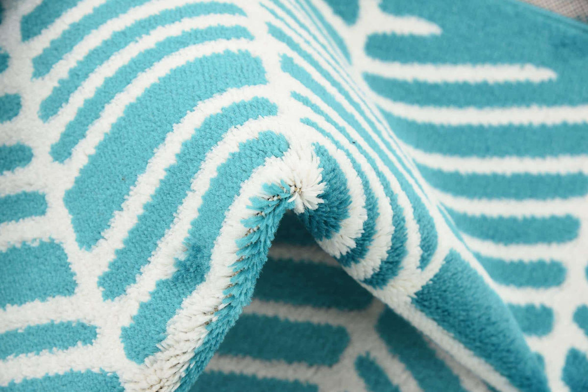 Rechteck Teppich Metropolis in Türkis von Hadorn™ - Lifestyle Image