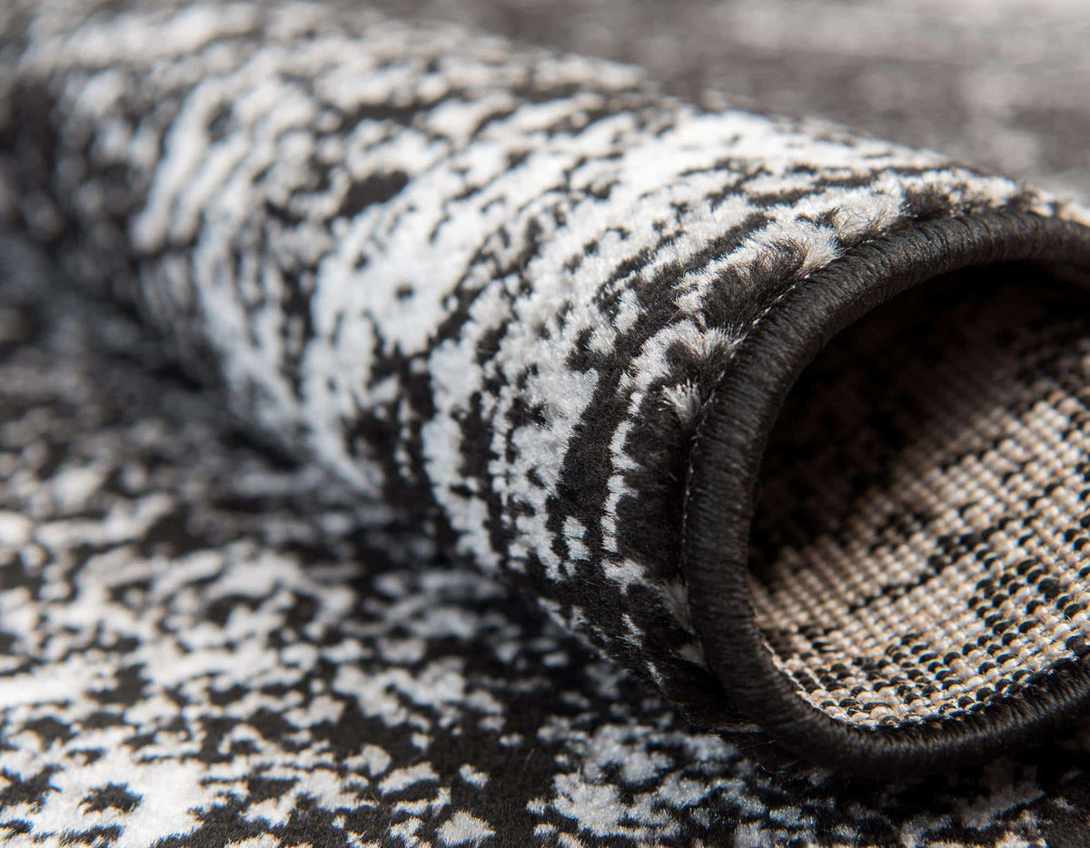 Quadratisch Teppich Monaco in Schwarz von Hadorn™ - Lifestyle Image