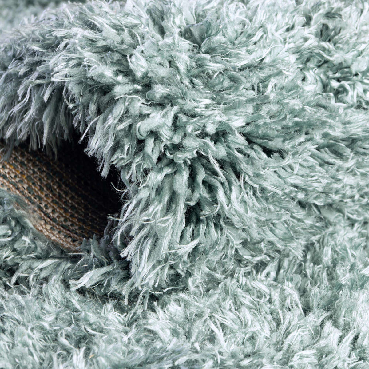 Rund Hochflorteppich Infinity Shag in Schieferblau von Hadorn™ - Lifestyle Image