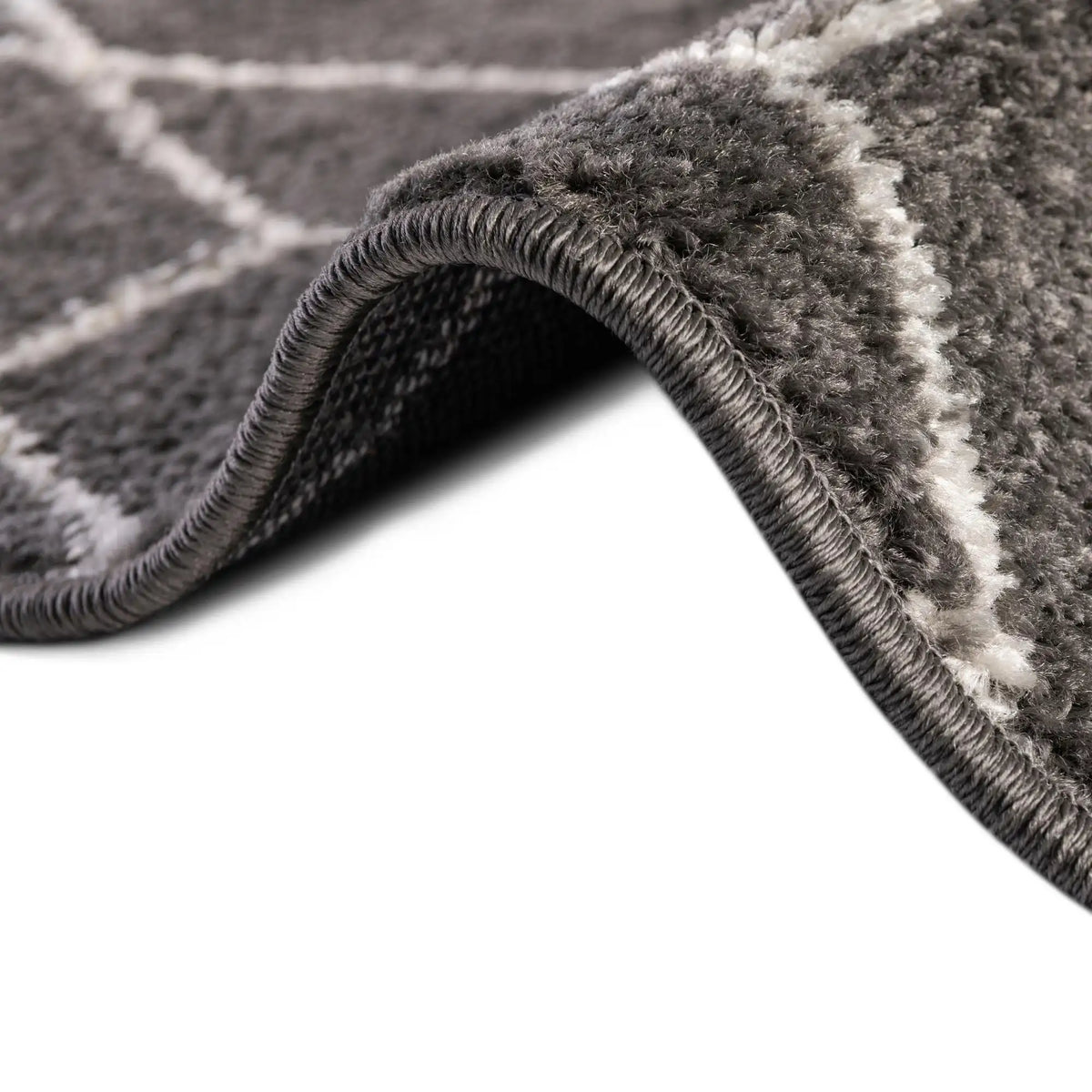 Oval Teppich Trellis Frieze in Dunkelgrau von Hadorn™ - Lifestyle Image