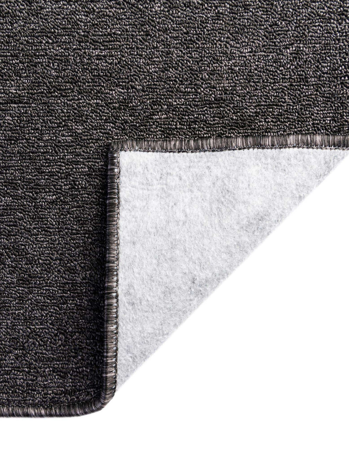 Rechteck Teppich Everyday Solid in Holzkohle von Hadorn™ - Lifestyle Image
